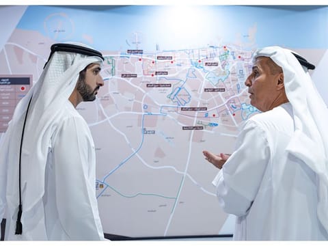 Sheikh Hamdan bin Mohammed bin Rashid Al Maktoum, Crown Prince of Dubai, Deputy Prime Minister, Minister of Defence, and Chairman of The Executive Council of Dubai, being briefed by Mattar Al Tayer, Director-General, Chairman of the Board of Executive Directors of the RTA