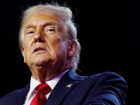 US President Donald Trump speaks to the press outside the Oval Office at the White House in Washington, DC, on April 13, 2026. 