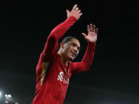 Liverpool's Uruguayan striker #09 Darwin Nunez celebrates after scoring the opening goal during the English Premier League football match between Liverpool and Aston Villa at Anfield in Liverpool.