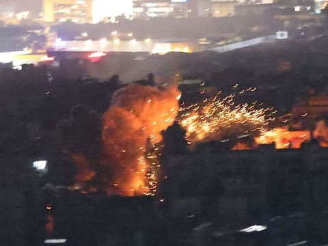 A ball of fire rises from the site of an Israeli airstrike that targeted a neighbourhood in Beirut's southern suburbs on November 13, 2024. 