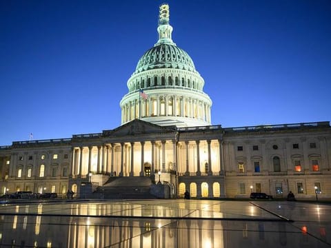 The US Capitol is seen at dusk in Washington