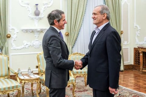 Pezeshkian welcoming Grossi (left) during a meeting in Tehran on November 14, 2024.  