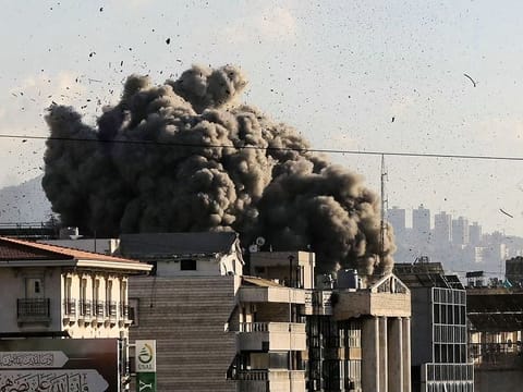 Smoke rises from the site of an Israeli airstrike that targeted a building in Beirut’s southern suburbs on November 16, 2024, amid the ongoing war between Israel and Hezbollah.