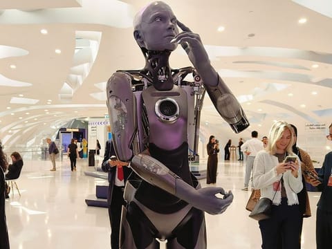 A humanoid gestures at Dubai Future Forum on Tuesday