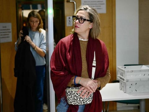 Gisele Pelicot's daughter Caroline Darian leaves the courthouse after a hearing in the trial of her father Dominique Pelicot accused of drugging her mother for nearly ten years and inviting strangers to rape her at their home in Mazan, a small town in the south of France, in Avignon, on November 18, 2024. 