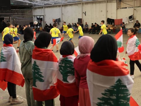 Children of displaced families take part in sports activities organised by civil society initiatives, at a public school in Beirut turned into a shelter for people fleeing Israeli bombardment on November 5, 2024.  