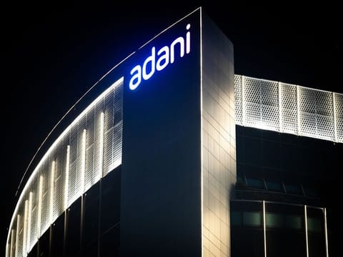 The Adani Group headquarters at night in Ahmedabad, India. 