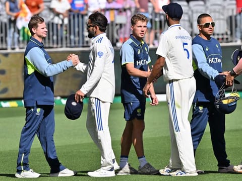 Indias Virat Kohli shakes hands with Australias Steve Smith at the end of the first Test cricket match at Optus Stadium in Perth on Monday.