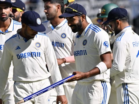 Indias stand-in skipper Jasprit Bumrah (centre) celebrates the victory over Australia with teammates on day four of first Test in Perth on Monday.