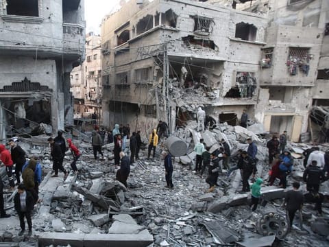 Palestinians inspect the damage at the site of an Israeli airstrike in the Nuseirat camp in central Gaza on November 27, 2024.