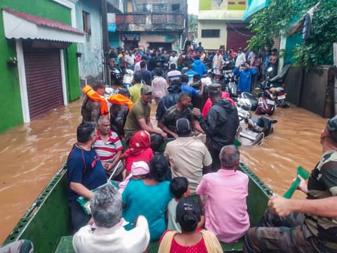 Indian Army personnel rescue stranded people from severely flooded areas following Cyclone Fengal, in Puducherry on Sunday.  