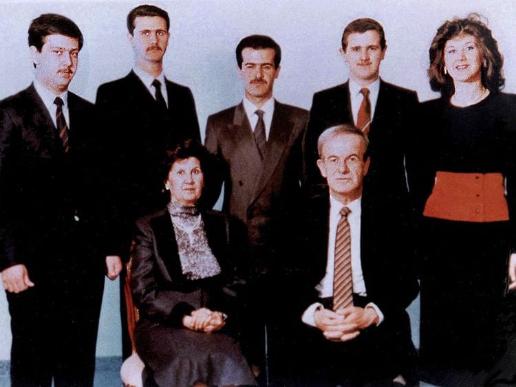 A family picture dated 1985 shows Syria's late president Hafez Al Assad and his wife Anissah Makhlouf (seated) and, behind them, from right their five children: Bushra, the late Majd, the late Bassel (1962-94), deposed president Bashar, and the youngest son, Maher.   