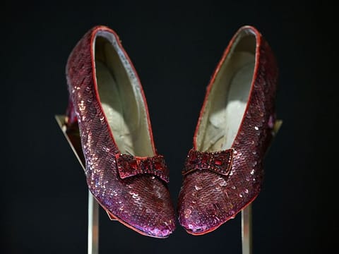 The ruby slippers worn by US actress and singer Judy Garland in the 1939 film The Wizard of Oz are pictured on display in London.