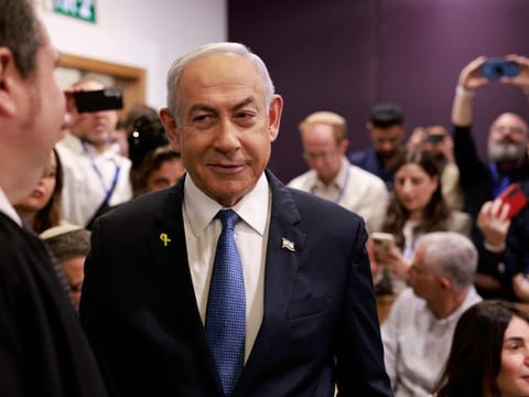 Israeli Prime Minister Benjamin Netanyahu arrives at the district court in Tel Aviv for his hearing on corruption charges on December 10, 2024.  