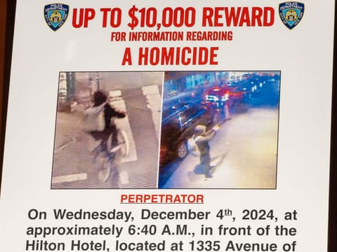 A wanted poster is set up for an NYPD press conference regarding a homicide that authorities believe was a targeted attack at One Police Plaza on December 4, 2024, in New York City. United Healthcare CEO Brian Thompson was shot before 7:00am this morning, before he was to attend the company's annual investors meeting.   