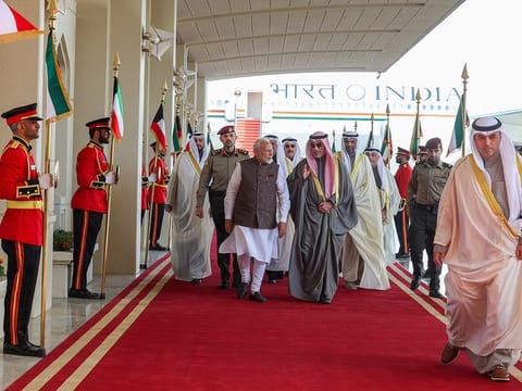 India's Prime Minister Narendra Modi receives a warm welcome on his arrival in Kuwait, on Saturday. 