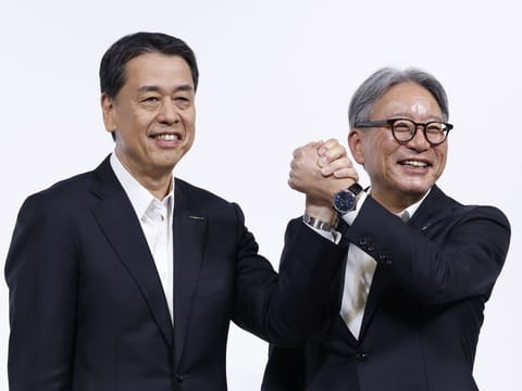 The presidents of Honda, Nissan and Mitsubishi Motor Corp. - Nissan's junior partner - were seen entering and leaving Japan's transportation ministry on Monday morning to inform officials of their plans to formally kick off merger talks. 