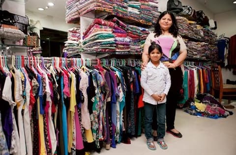 Laxmi with her boss, Bosky Arora, who describes her as a wonderful, confident young woman.  