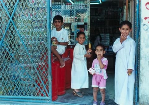 Children at a grocery store in Hatta, Dubai, in 1994. 