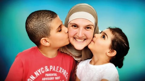 Gina with her children Karim and Noor. While respecting government regulations, Gina looks forward to getting together with family and close friends this Eid 