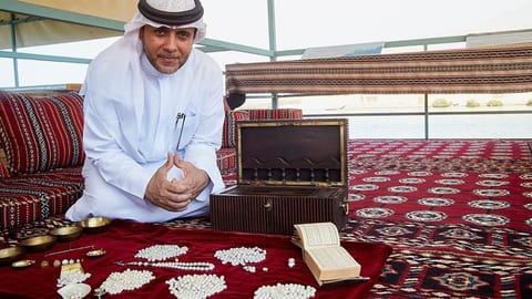 Abdullah Al Suwaidi displays the huge variety of pearls that have been harvested from Al Rams’ waters 