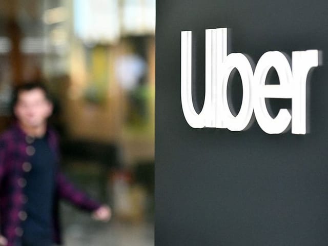 Uber posts first annual net profit since IPO